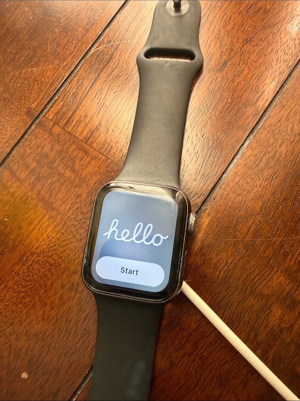 Apple Smartwatch with Black Sport Band and Silver Case + charger